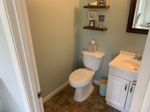 109 Stirrup Key Woods Rd Unit 1B2, Marathon, FL 33050 - bathroom with toilet, baseboards, and vanity