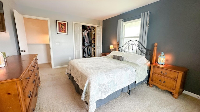109 Stirrup Key Woods Rd Unit 1B2, Marathon, FL 33050 - bedroom with light colored carpet, a closet, and baseboards