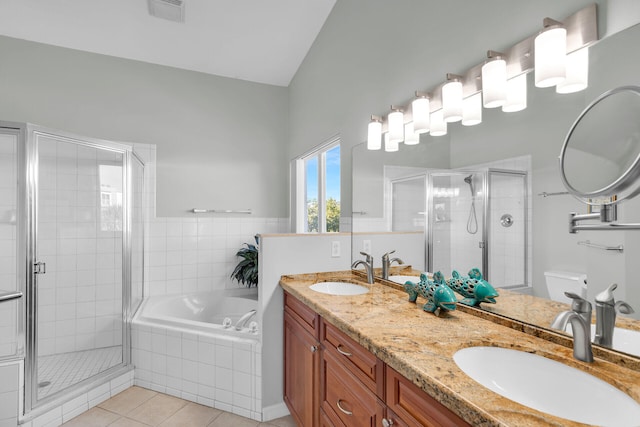 bathroom with a sink, visible vents, and a shower stall