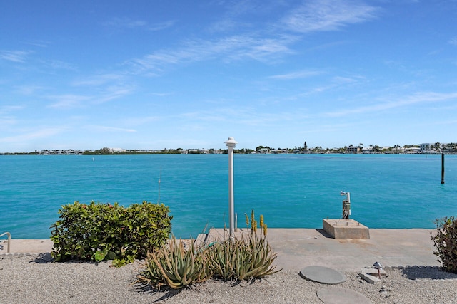 view of water feature with a dock