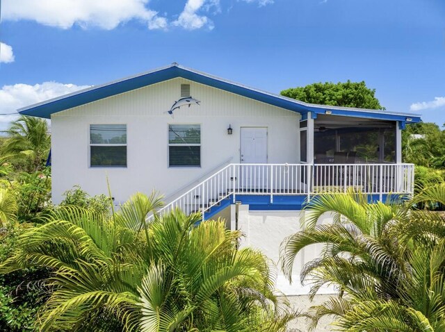 421 Ixora Dr, Big Pine, FL 33043 - view of front of house with stairway