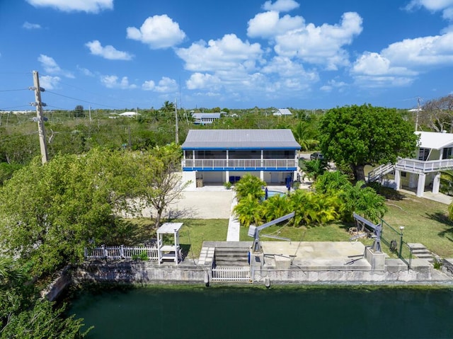 421 Ixora Dr, Big Pine, FL 33043 - back of house featuring a water view