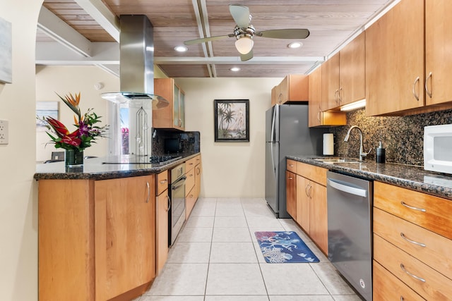 280 100th St, Ocean, Marathon, FL 33050 - kitchen featuring a ceiling fan, island range hood, tasteful backsplash, a sink, and stainless steel appliances