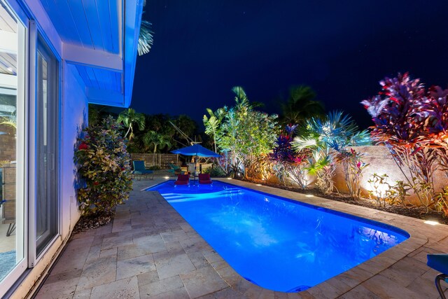 280 100th St, Ocean, Marathon, FL 33050 - pool at twilight featuring a patio, a fenced backyard, and a fenced in pool