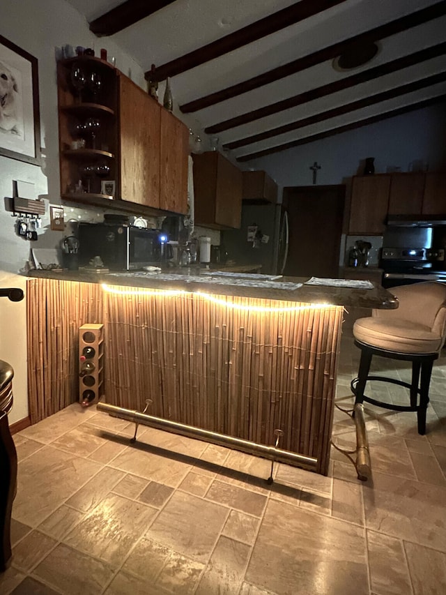 kitchen featuring open shelves, lofted ceiling with beams, dark countertops, and electric range oven
