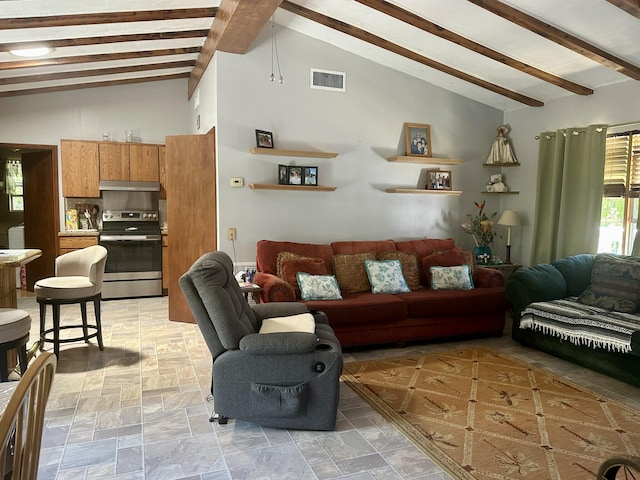 living room featuring lofted ceiling with beams and visible vents