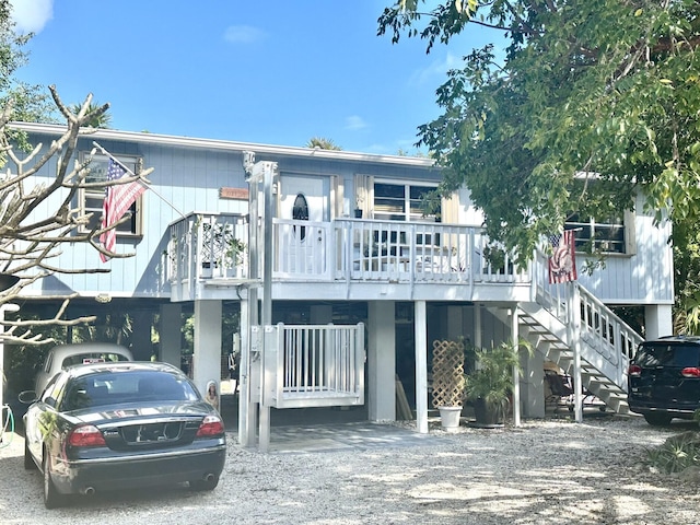 view of front of home featuring stairway