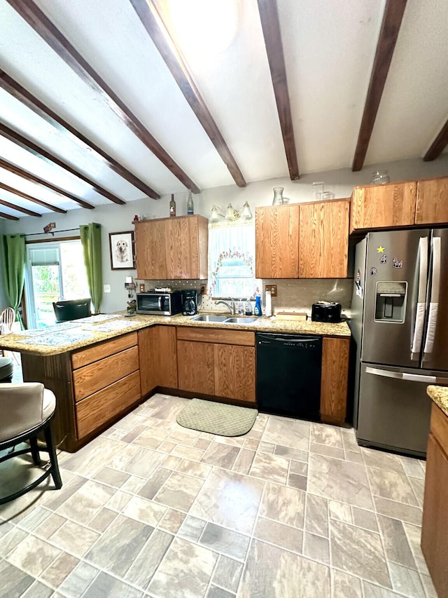 kitchen with stainless steel refrigerator with ice dispenser, a sink, black dishwasher, and beam ceiling