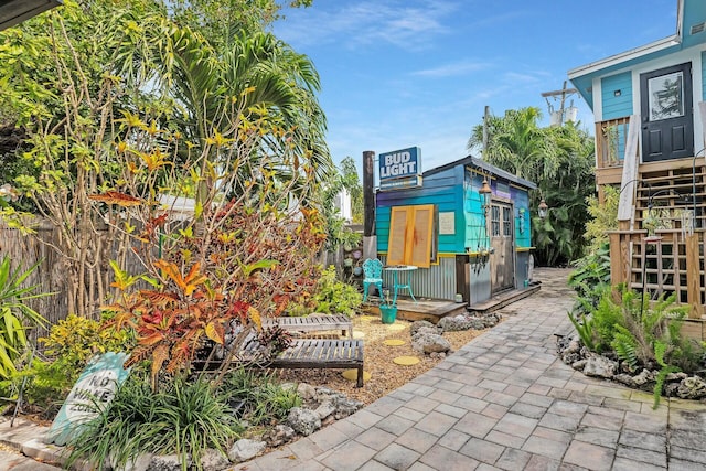 view of patio with an outdoor structure