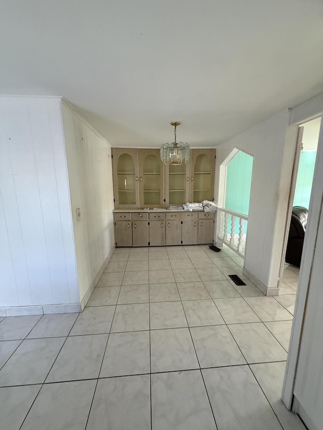 27858 Lobster Tail Trl, Little Torch, FL 33042 - unfurnished dining area with a chandelier and baseboards