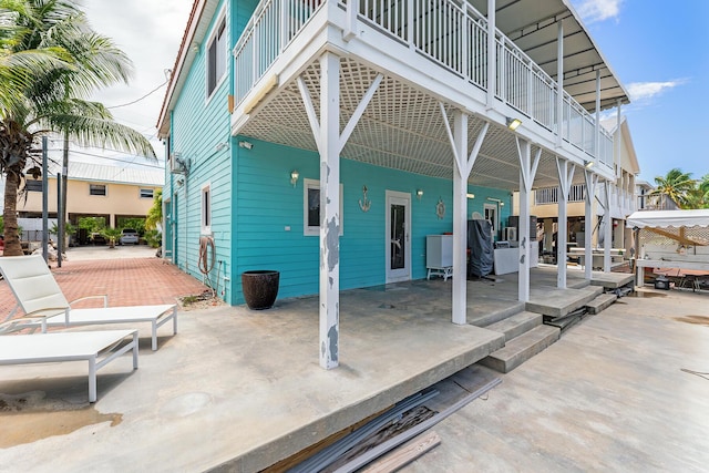 back of house with a patio area