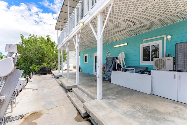 view of patio with ac unit