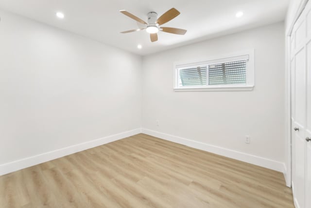 unfurnished bedroom featuring light wood-style flooring, baseboards, a ceiling fan, and recessed lighting