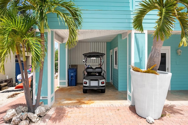 exterior space with a carport