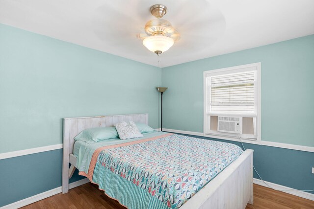 31034 Hollerich Dr, Big Pine, FL 33043 - bedroom with wood finished floors and a ceiling fan