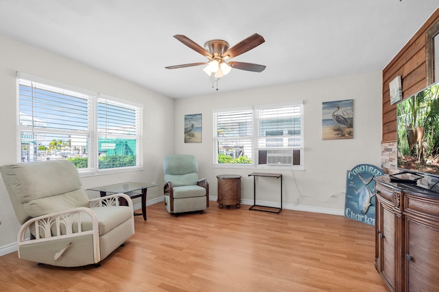 31034 Hollerich Dr, Big Pine, FL 33043 - living area featuring light wood-style floors and a ceiling fan
