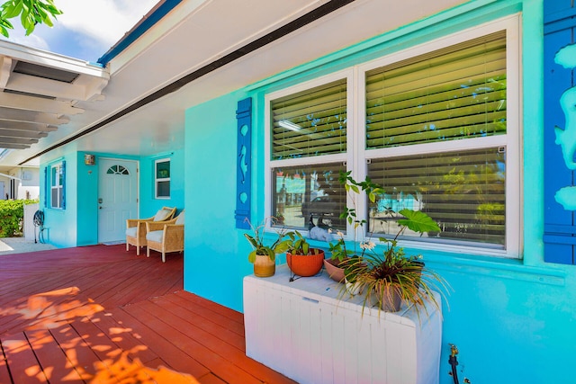 31034 Hollerich Dr, Big Pine, FL 33043 - wooden porch featuring radiator heating unit