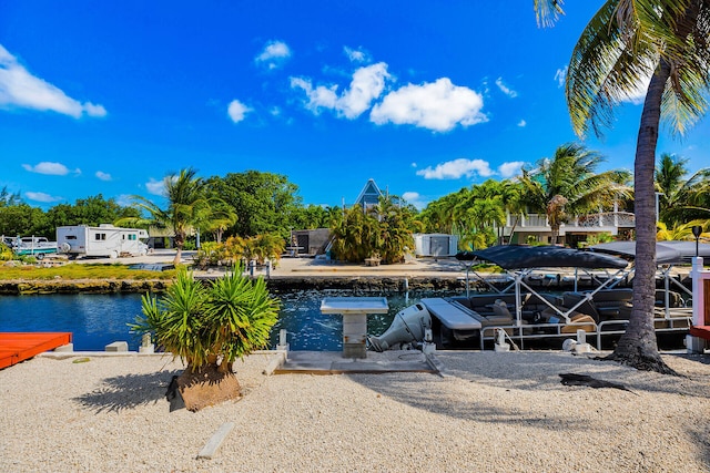 31034 Hollerich Dr, Big Pine, FL 33043 - view of pool with a dock and a water view