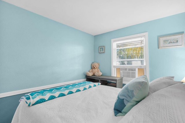 31034 Hollerich Dr, Big Pine, FL 33043 - bedroom with baseboards and cooling unit