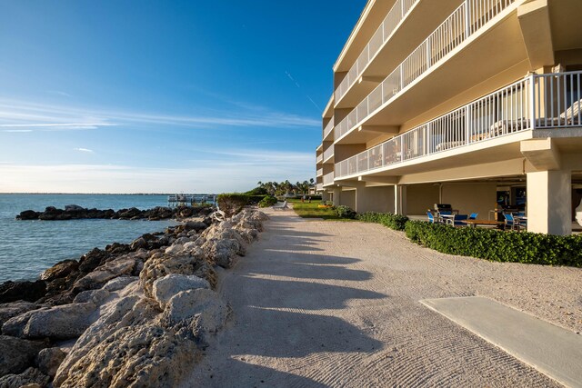 exterior space with a water view