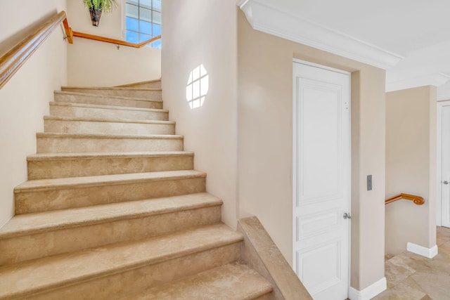 160 1st St, Key Colony, FL 33051 - staircase with baseboards and ornamental molding