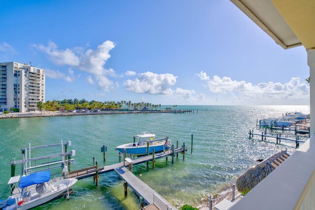 160 1st St, Key Colony, FL 33051 - dock area featuring a water view and boat lift