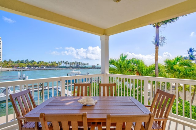 160 1st St, Key Colony, FL 33051 - balcony featuring outdoor dining space, boat lift, a water view, and a dock
