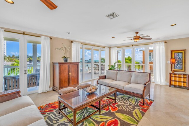 160 1st St, Key Colony, FL 33051 - living room featuring a ceiling fan, french doors, plenty of natural light, and ornamental molding