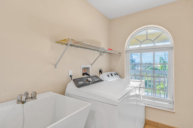 160 1st St, Key Colony, FL 33051 - laundry area with washer and clothes dryer and baseboards