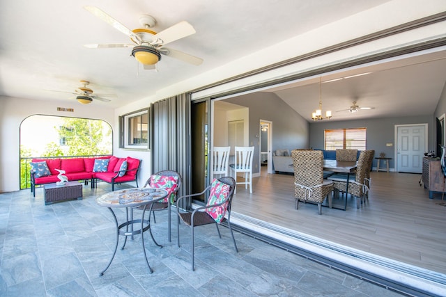 exterior space with ceiling fan, an outdoor living space, and outdoor dining space