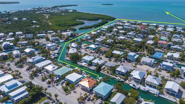 aerial view with a water view and a residential view