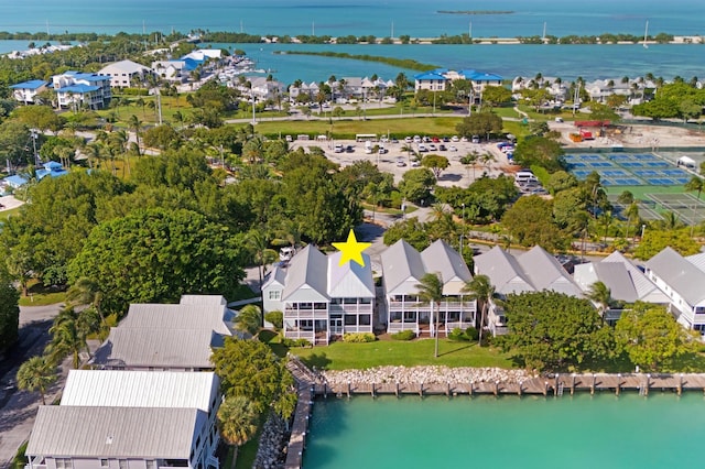 bird's eye view featuring a residential view and a water view