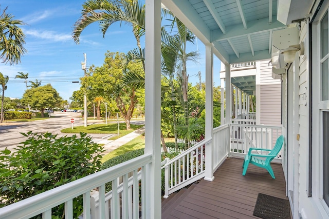 wooden deck featuring covered porch