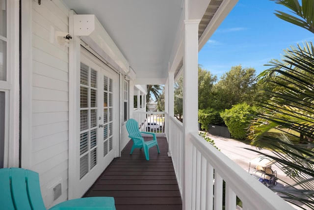 balcony featuring french doors