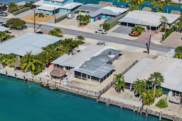 bird's eye view featuring a residential view and a water view