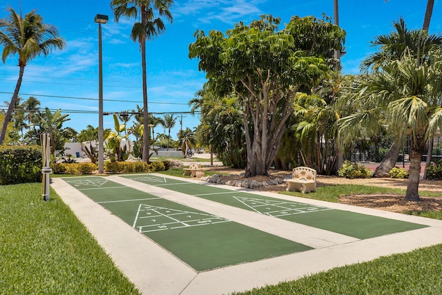 1001 Ocean Dr Unit 1-305, Key Colony, FL 33051 - surrounding community with shuffleboard and a yard