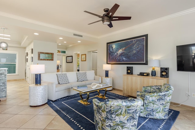 living room with ceiling fan, visible vents, ornamental molding, and light tile patterned floors