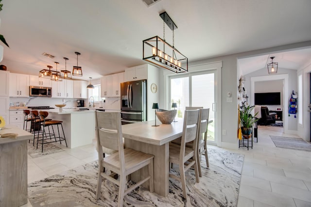 930 80th St, Marathon, FL 33050 - dining room with a chandelier