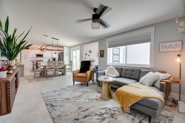 930 80th St, Marathon, FL 33050 - living room with plenty of natural light, ceiling fan, and light tile patterned floors