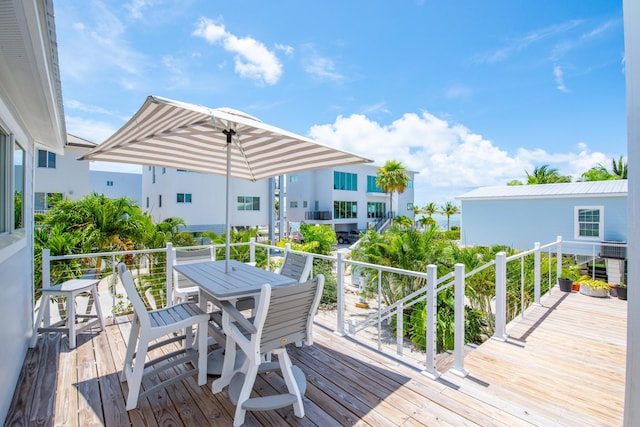 930 80th St, Marathon, FL 33050 - wooden deck featuring outdoor dining space