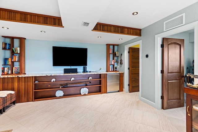 living room with recessed lighting and visible vents