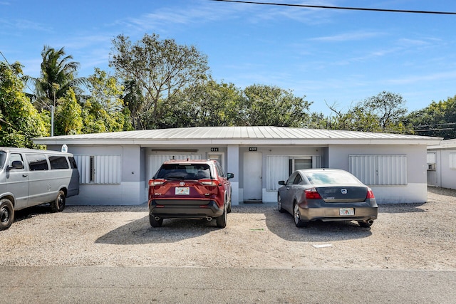 view of front facade featuring metal roof