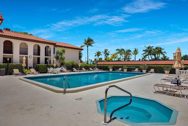pool featuring a patio area