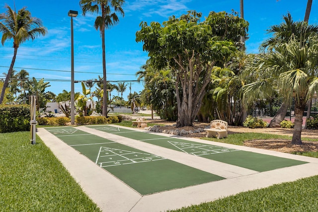 view of home's community featuring shuffleboard