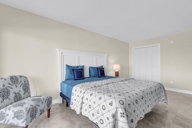 bedroom featuring baseboards