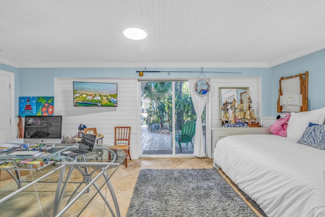 bedroom featuring access to exterior, tile patterned flooring, and ornamental molding