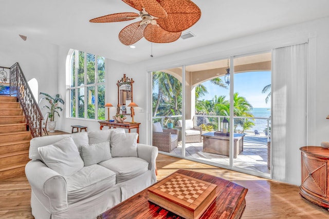 living room with stairway, recessed lighting, visible vents, and a ceiling fan