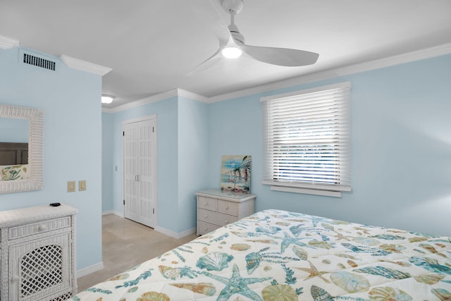 bedroom with crown molding, a closet, baseboards, and visible vents