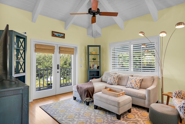 835 70th St, Gulf, Marathon, FL 33050 - living area featuring french doors, wood finished floors, healthy amount of natural light, beamed ceiling, and a ceiling fan