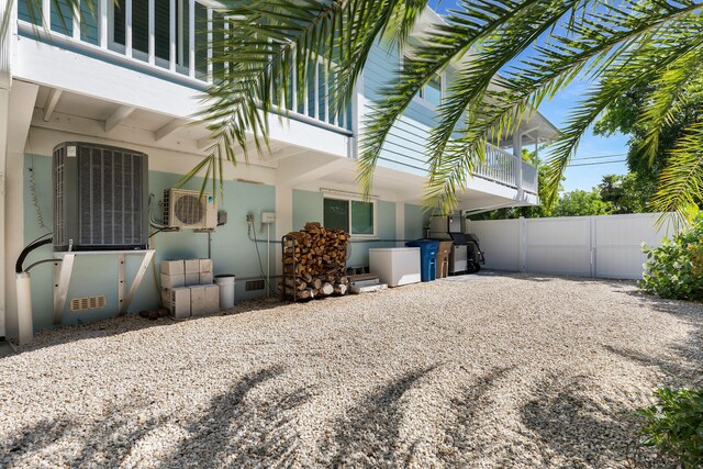 835 70th St, Gulf, Marathon, FL 33050 - view of side of property featuring ac unit, central AC unit, and crawl space